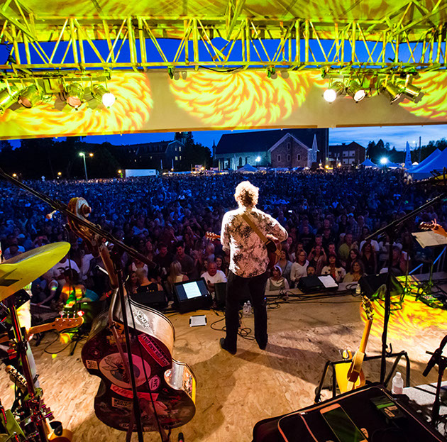 Matt Vee performing to massive outdoor crowd