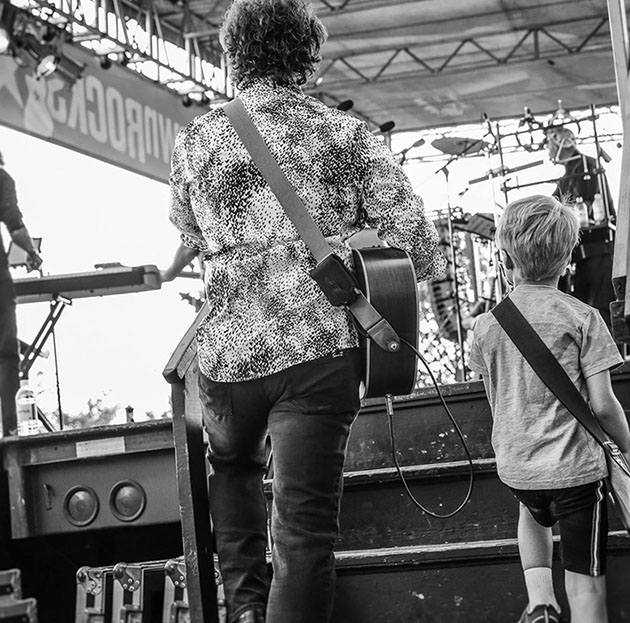 Musician performing at outdoor festival